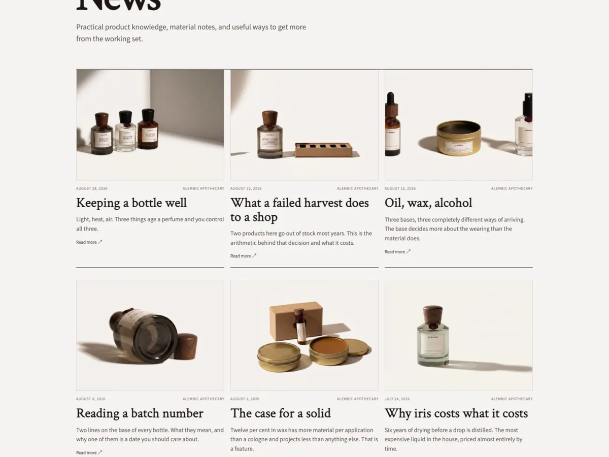Alembic Journal index: article cards with warm covers, dates and headlines in the house serif
